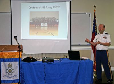 Color Guard Commander Paul Prescott leads the Color Guardto open and close the meeting.