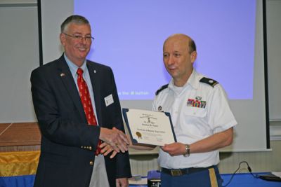 Chapter Vice President Rick Reese presentsCol. Nepute with the SAR Speaker's Appreciation certificate.