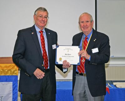 Rick Reese is given a Certificate of Appreciation by Past President Bob Shaw