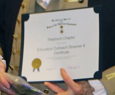 2) Education Outreach Streamer & Certificate